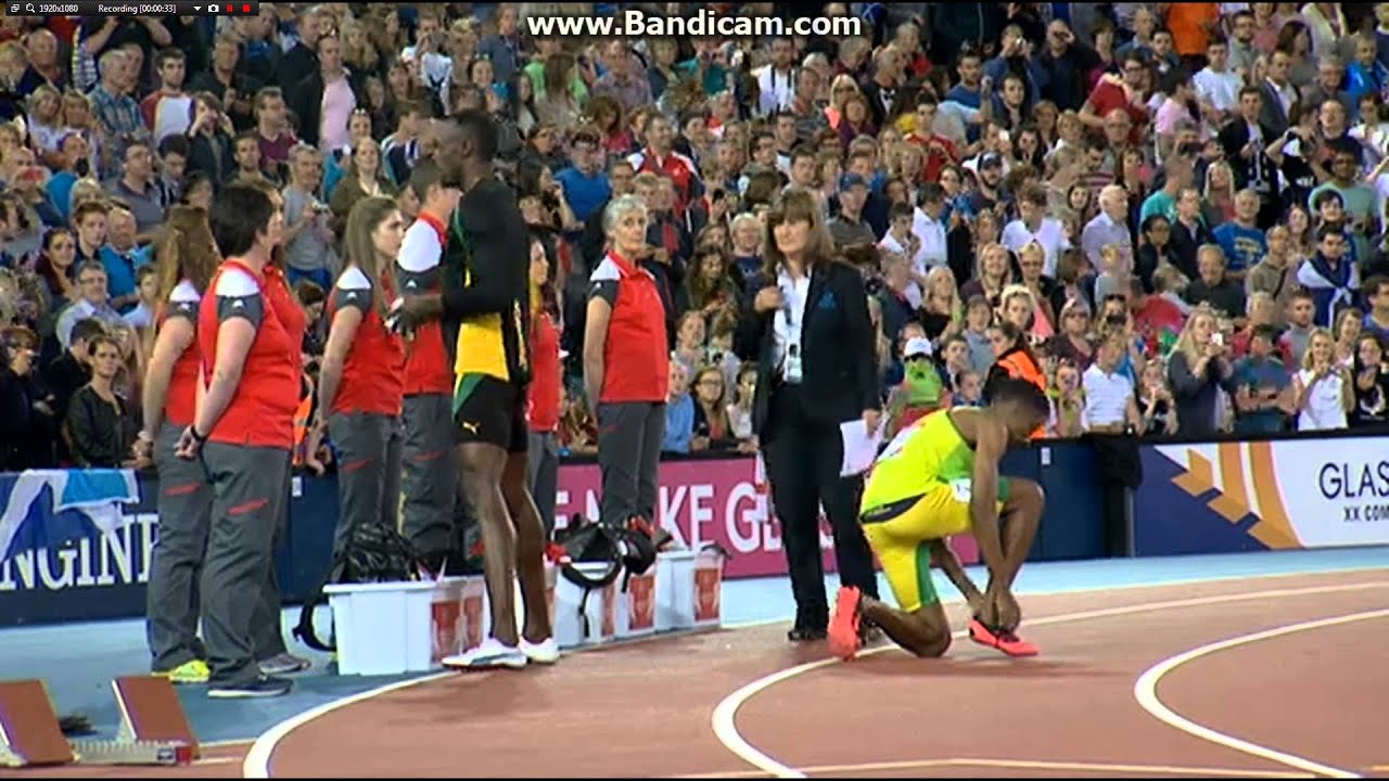 Usain Bolt engages kit girl at commonwealth games 2014