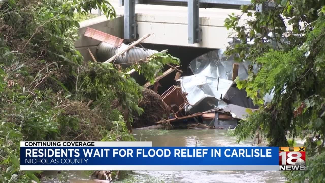 Residents wait for flood rel9ef in Carlisle