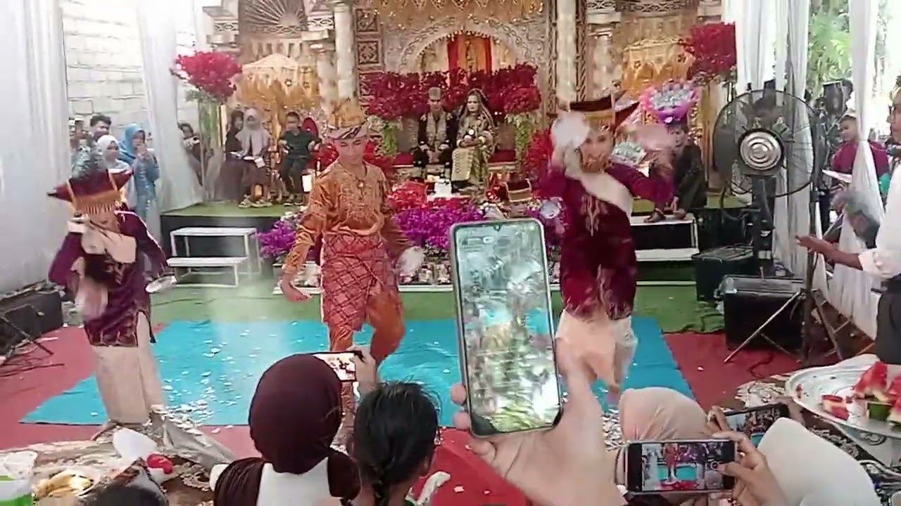 Persembahan tari piring resepsi pernikahan ccd OKI & RONA di Darmasraya 310126
