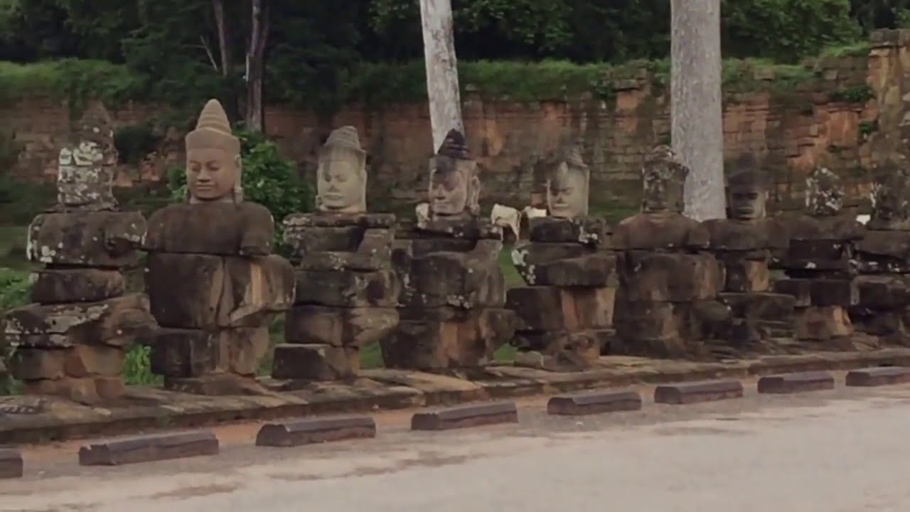 Monkey Eating Banana at Angkor Wat Temple in Siem Reap Cambodia
