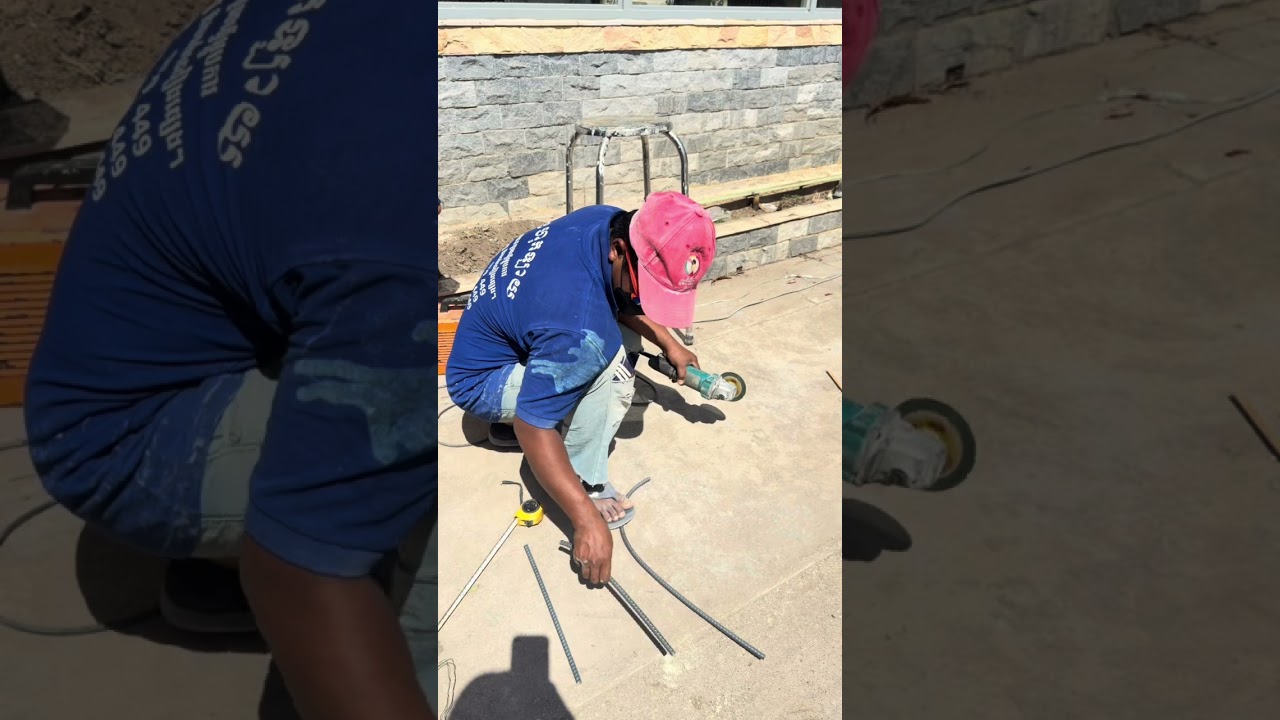 Welder assembling steel reinforcement for building columns