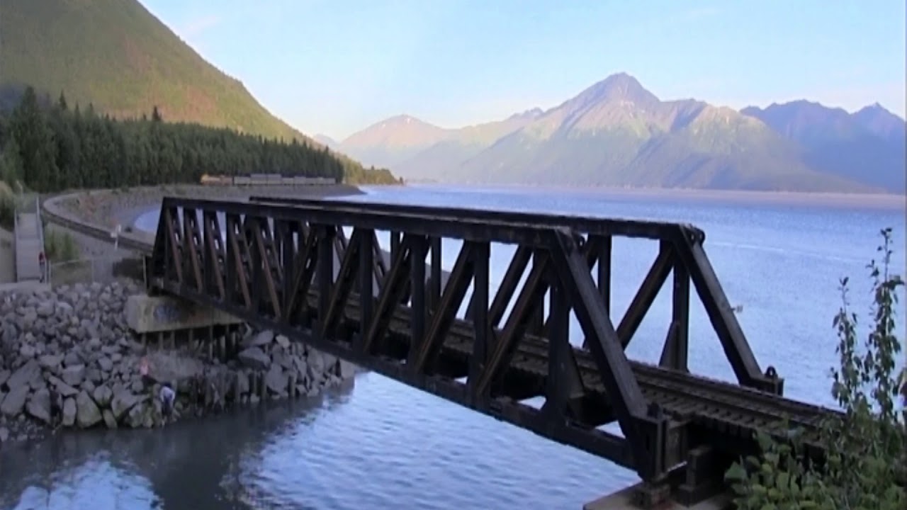Alaska Railroad passenger train crosses Bird Creek bridge