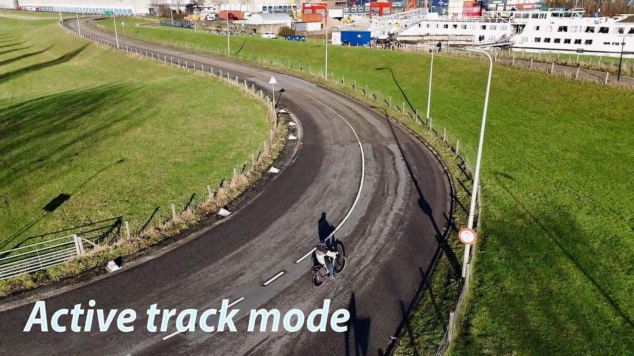 Active Track auto mode DJI Mini 4 Pro along a dike in Holland