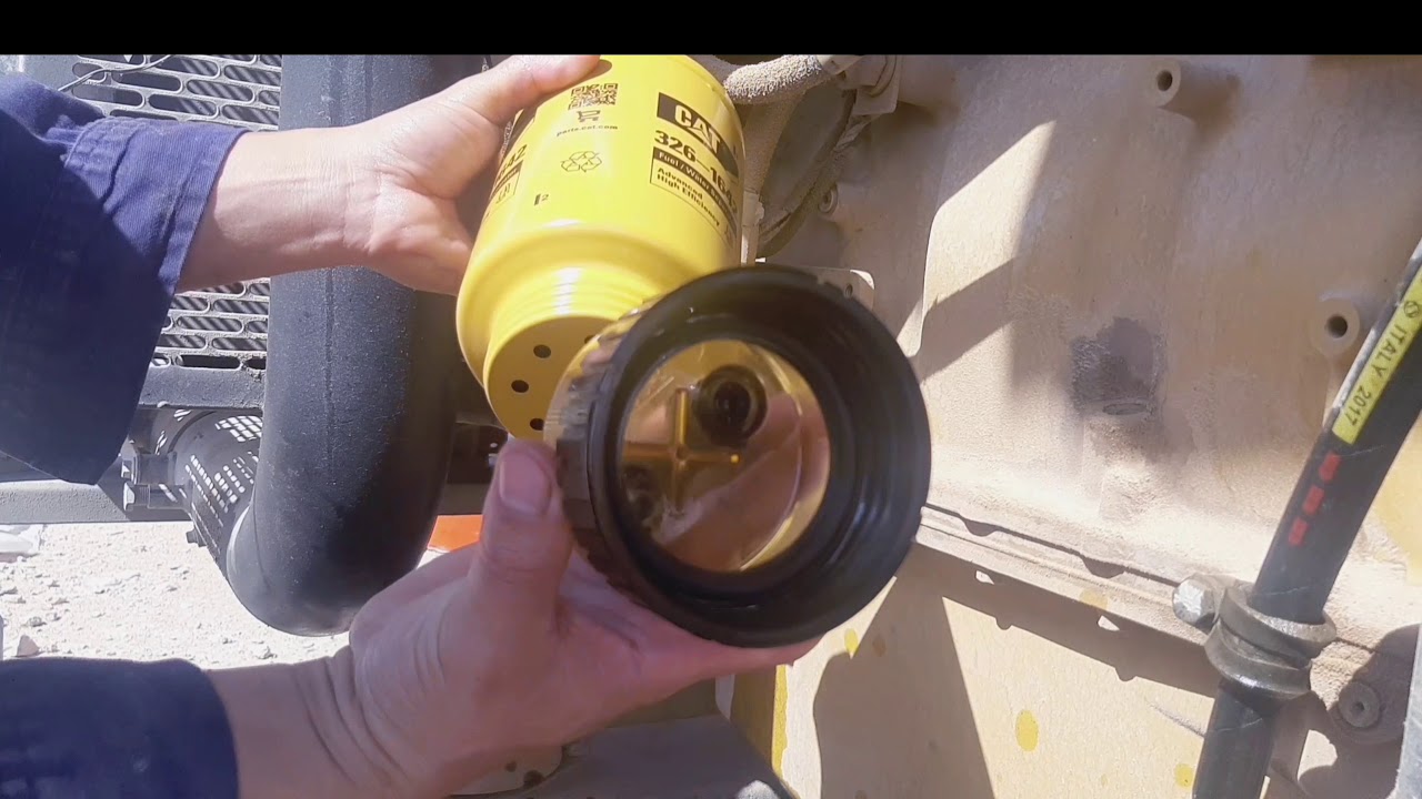 How to Replace Water/Separator CATERPILLAR // C18 Tutorial