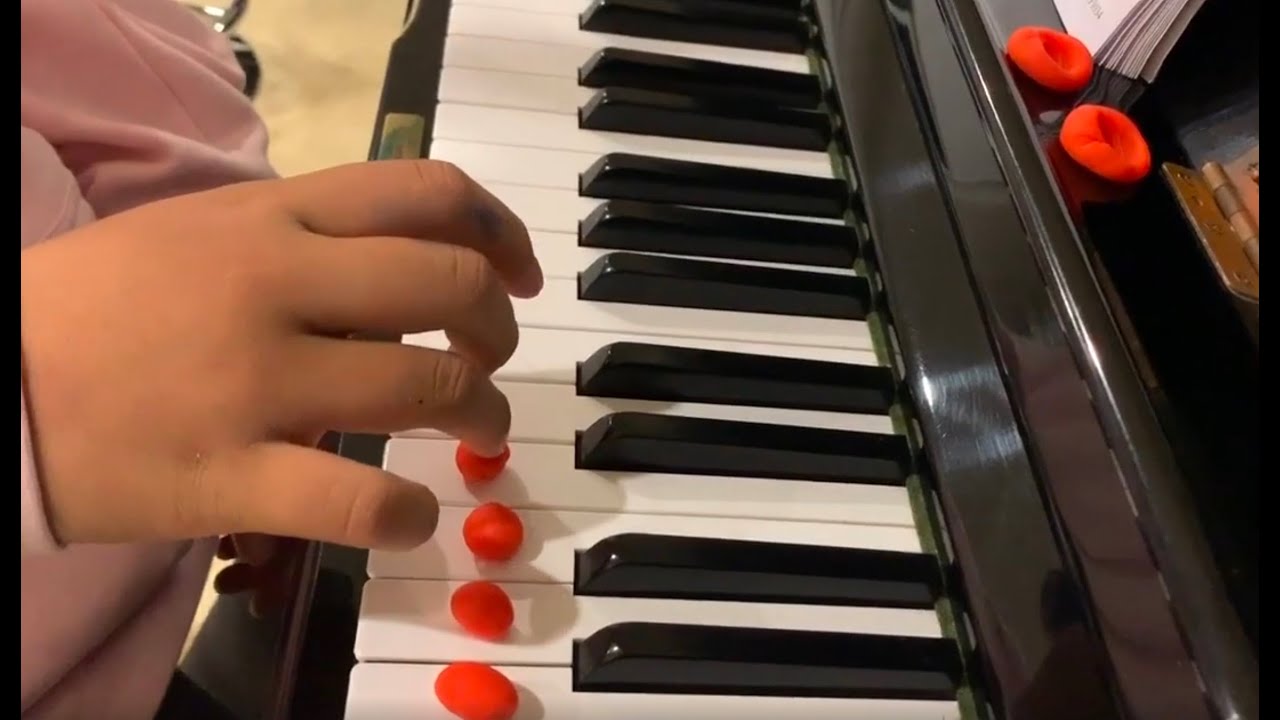 Teaching mezzo staccato on the piano