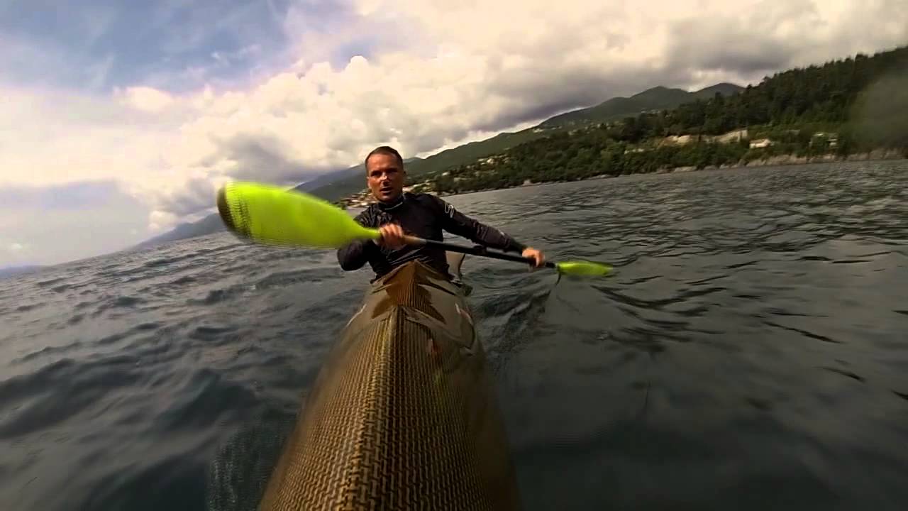 Kayak low brace and roll practice with a wing paddle