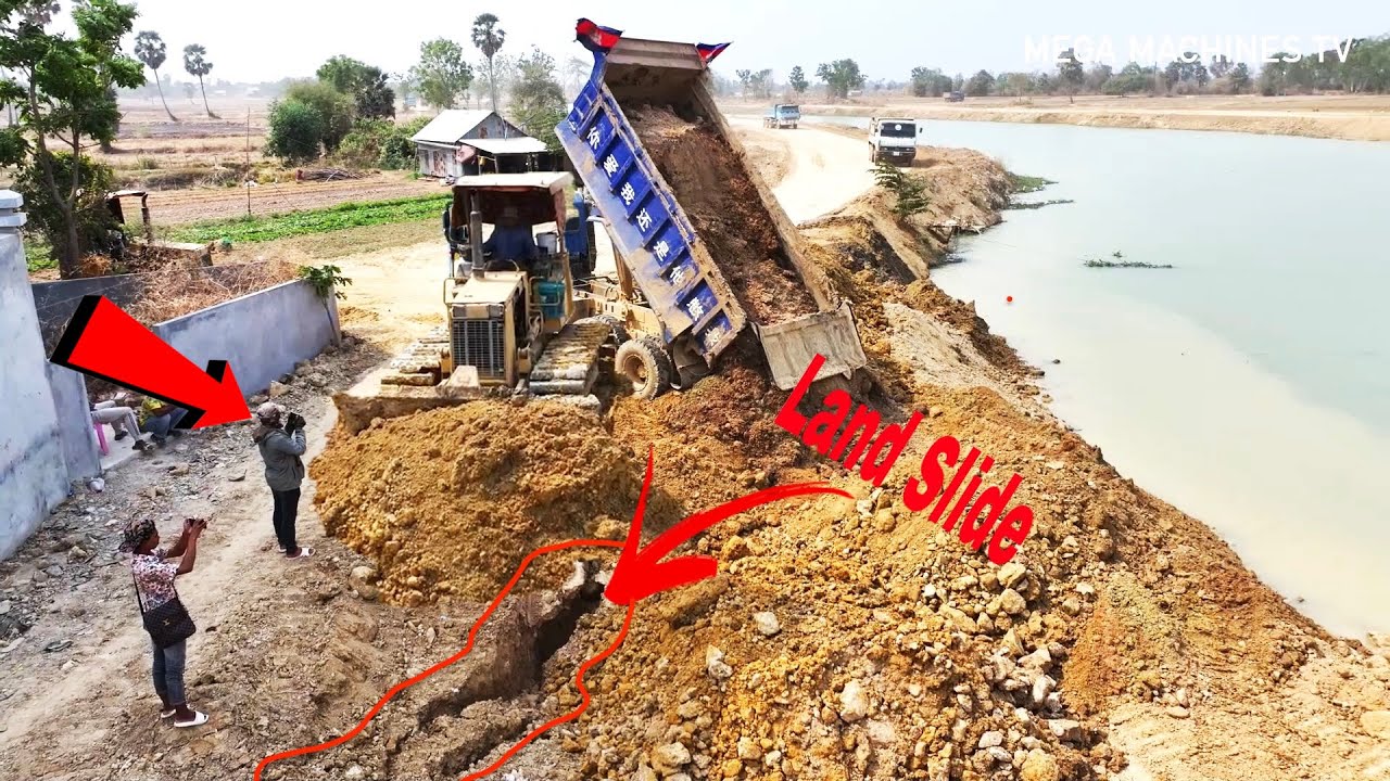 Incredible LandSlide! 10Wheel Dump Truck & Bulldozer Working Hard To Finish The Road Along The Lake