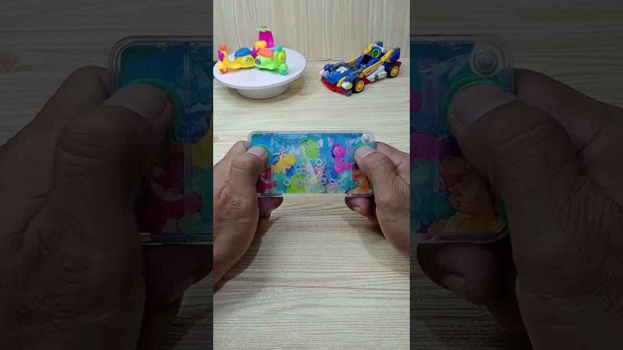 Playing water game dino#gaming #toys #fidgettoys #fun #watergame