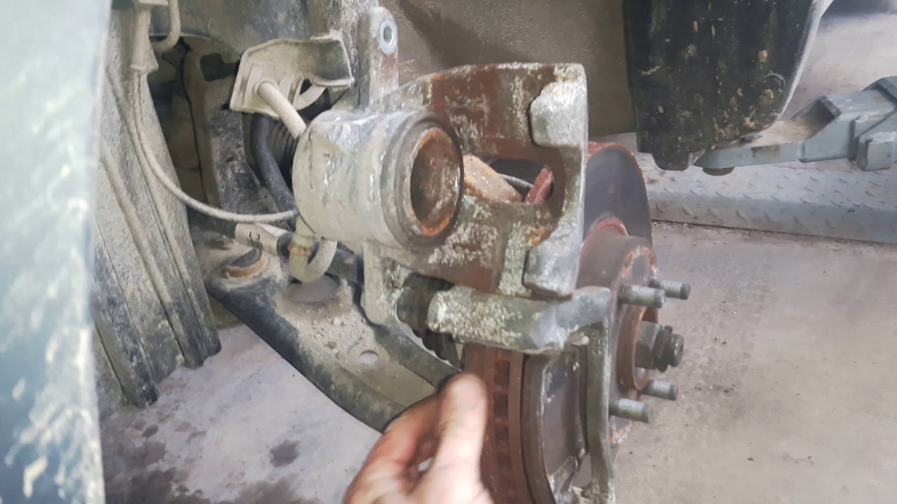 Nissan micra k13 how to change front brake pads