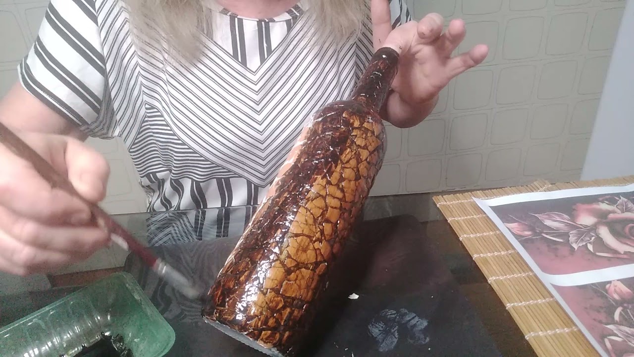 GARRAFA COM CASCA DE OVOS E ENVELHECIDA COM BETUME.       Eggshell Bottle