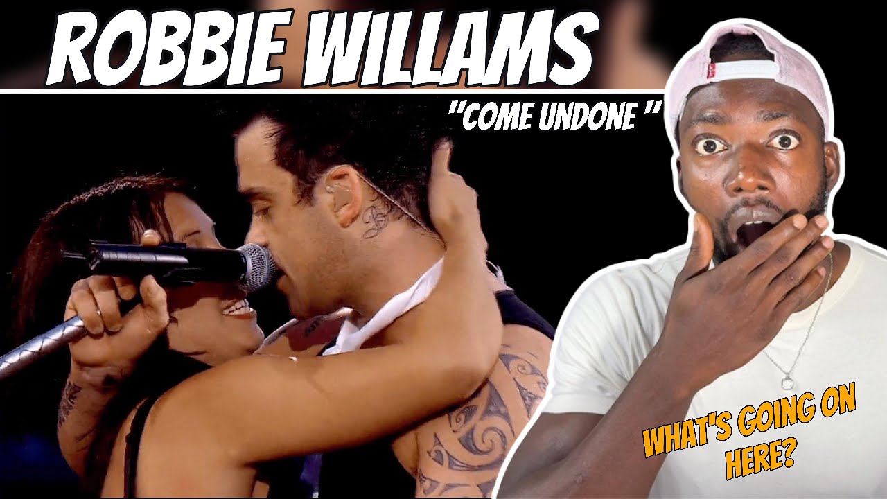 MY FIRST TIME SEEING SOMETHING LIKE THIS ON STAGE! Robbie Williams - Come Undone (Live at Knebworth)