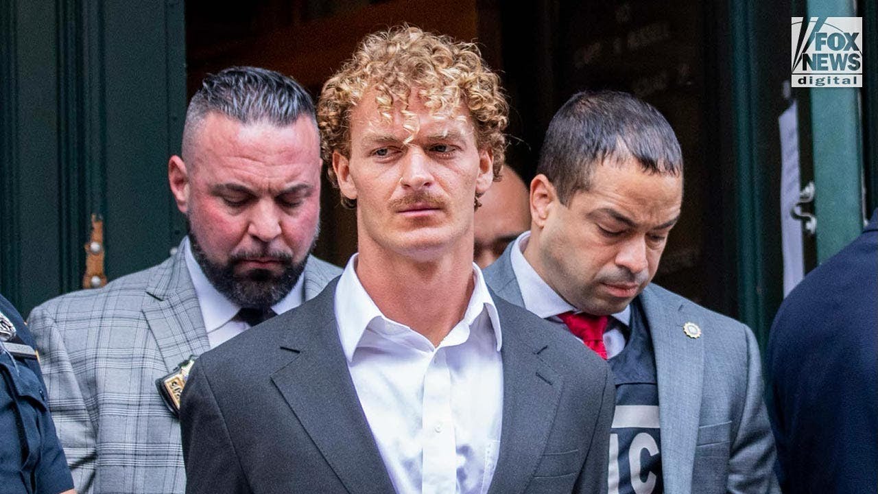 Former US Marine arrested , charged in killing homeless person was attacking passengers on New York