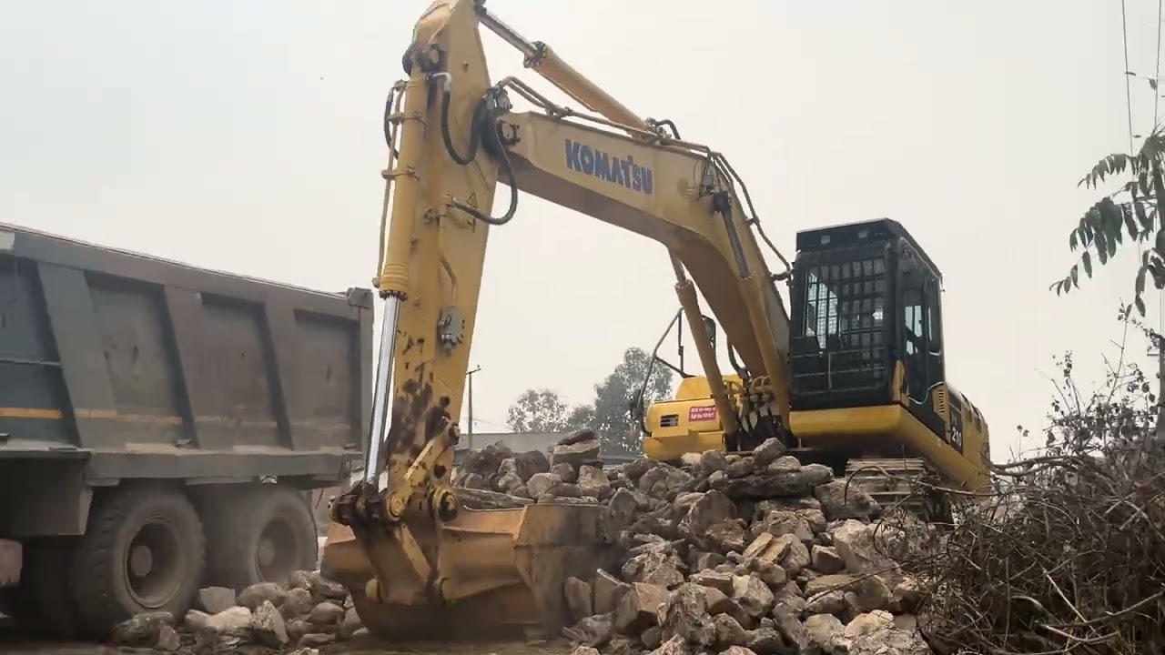 Powerful Komatsu Excavator Loading Big Stones into Dump Truck | Heavy Equipment Working”