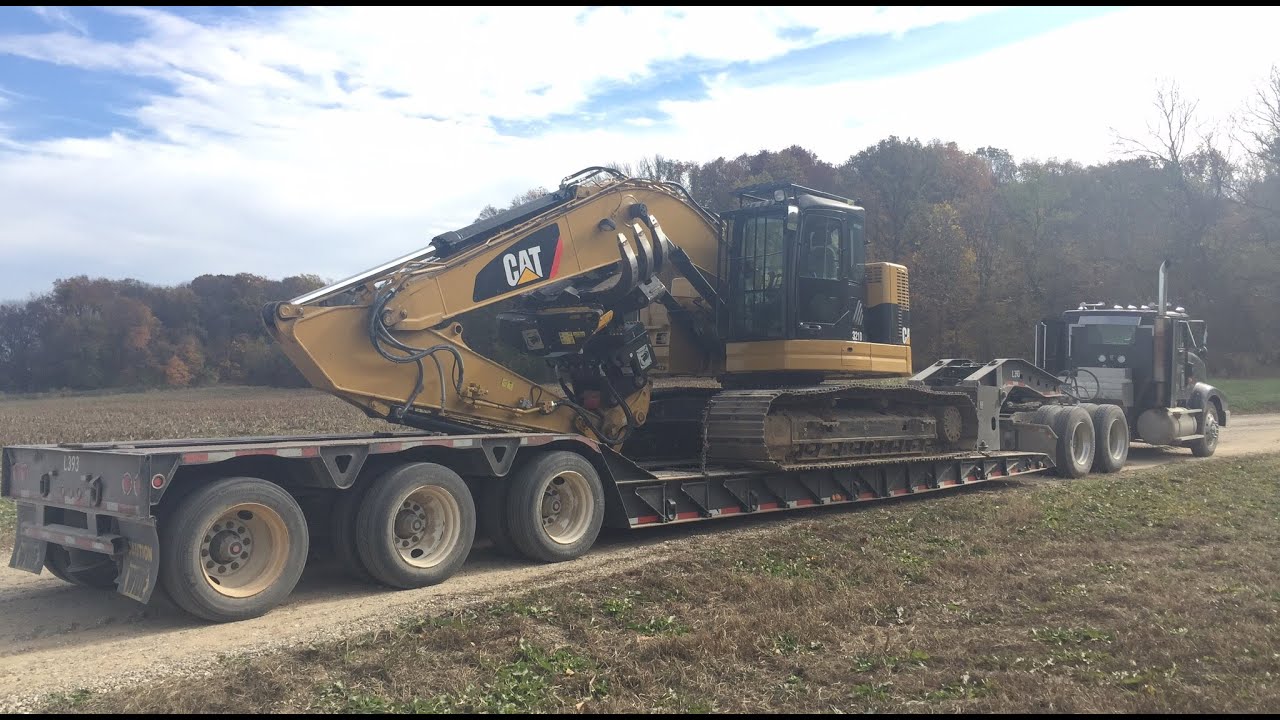 Cat 321D with rotobec saw attachment