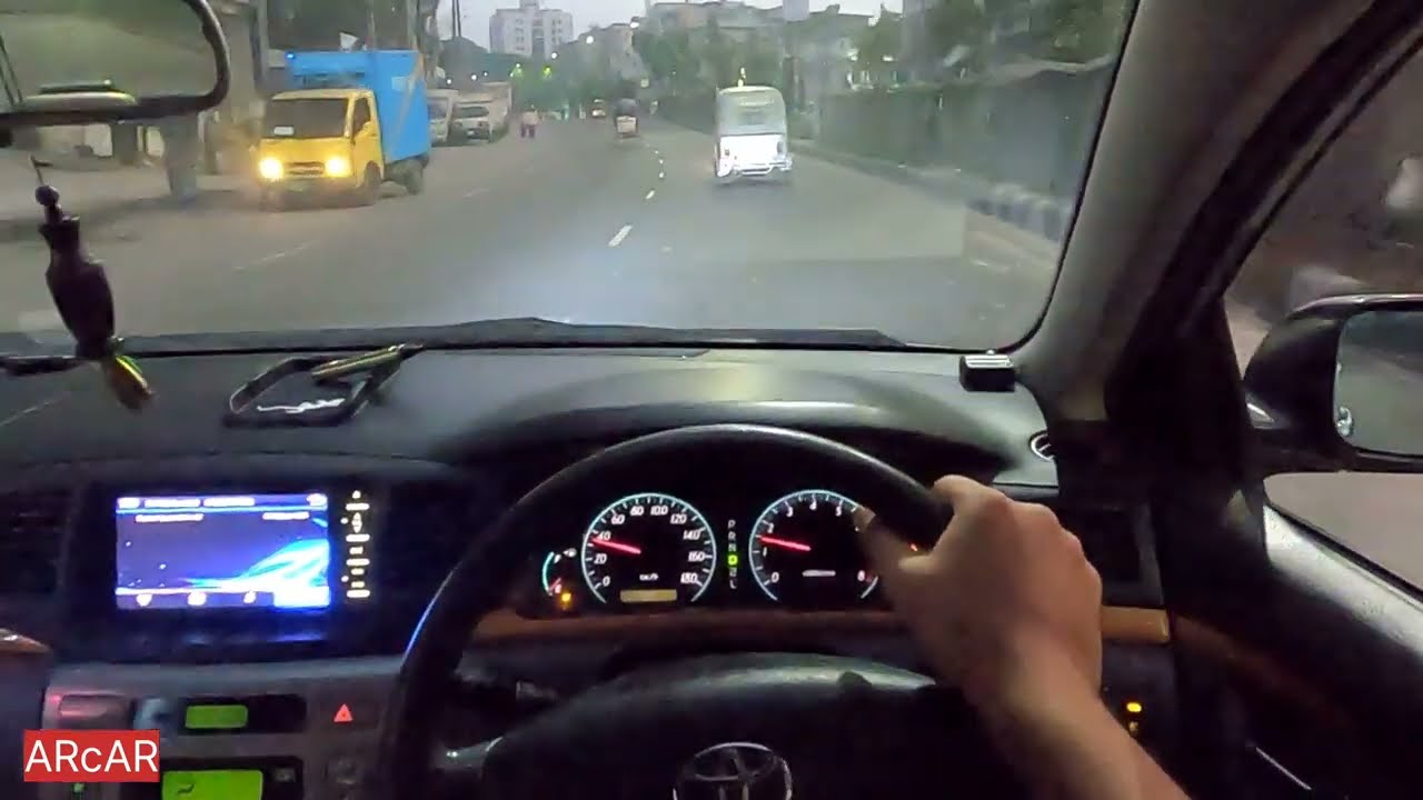 City waking up. Toyota Corolla POV drive.