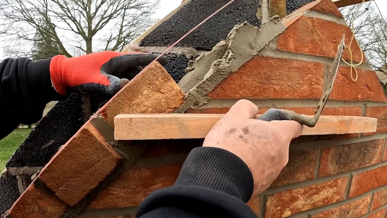 Bricklaying with MASTER Budd, finishing the gable dentil detail