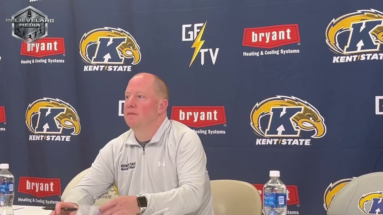 Kent St. coach Rob Senderoff, Chris Payton & Cli'Ron Hornbeak after their 83-77 win vs Cleveland St.