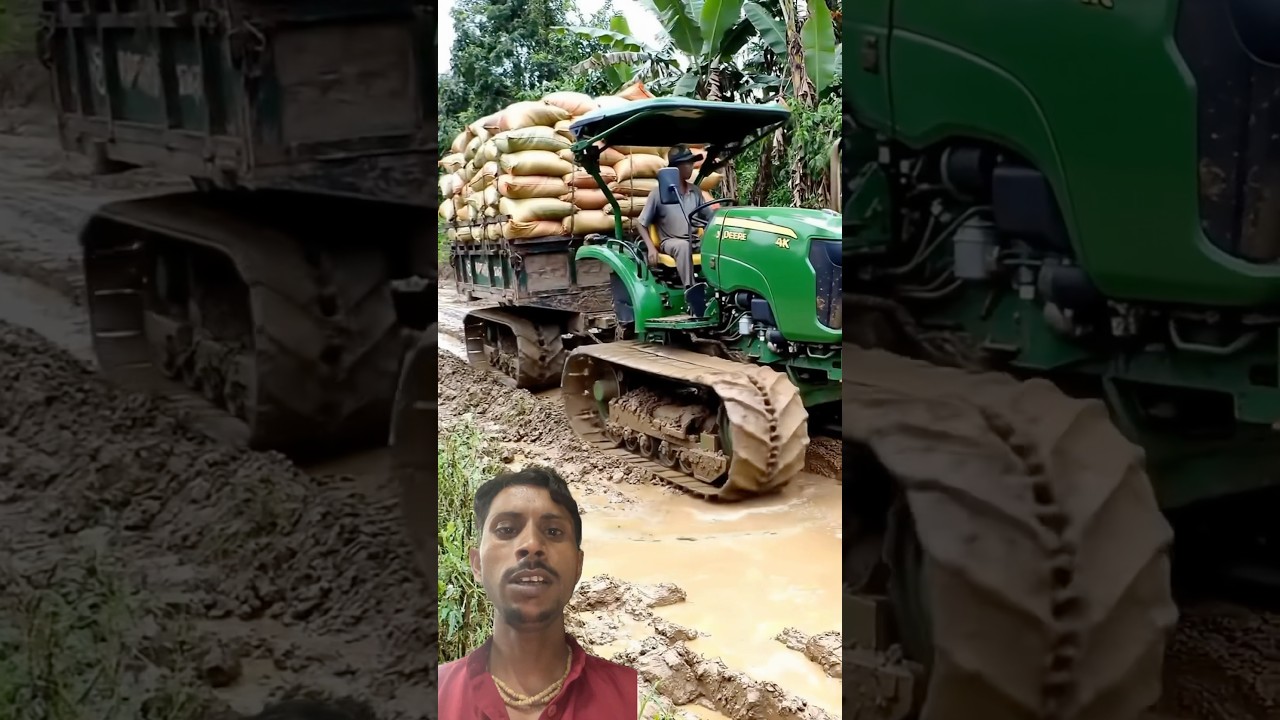 ￼ John Deere 4K chain tractor Dhaan ki full loading trolley ko lekar Jata hua #farming #johndeere