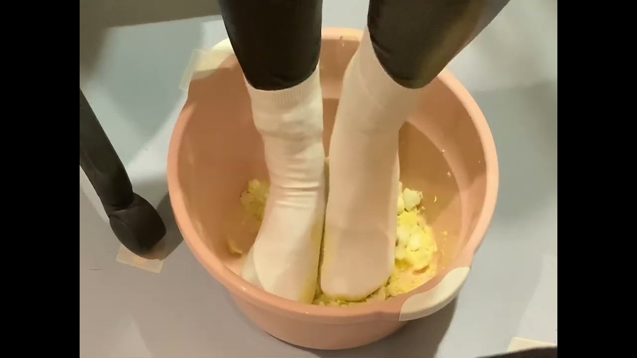 White socks and leather pants trampling eggs.