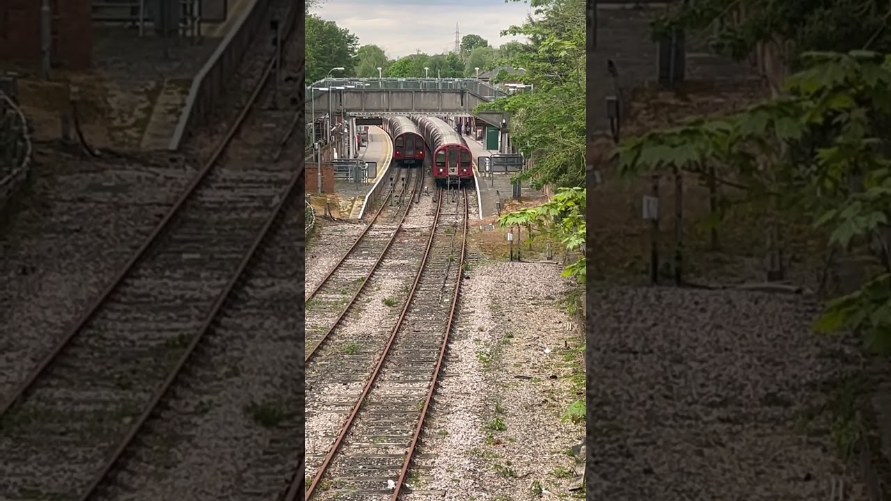 Overhead Central Line track view on a bridge near Epping Station