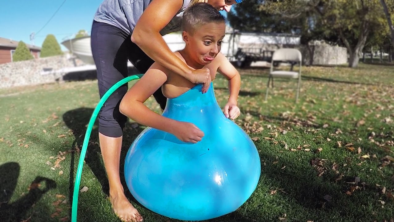 FITTING INSIDE A GIANT WATER BALLOON!!