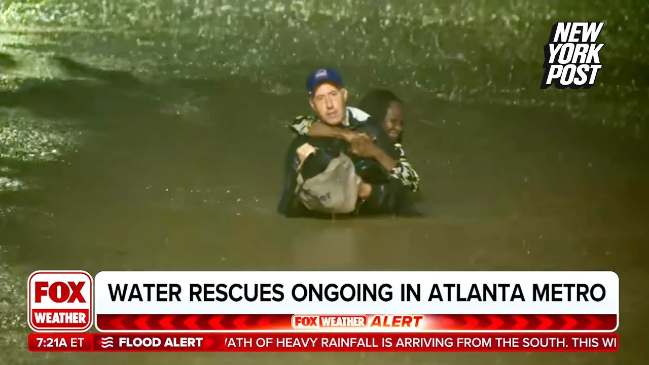 Fox Weather reporter rescues screaming woman from car as floodwaters rise