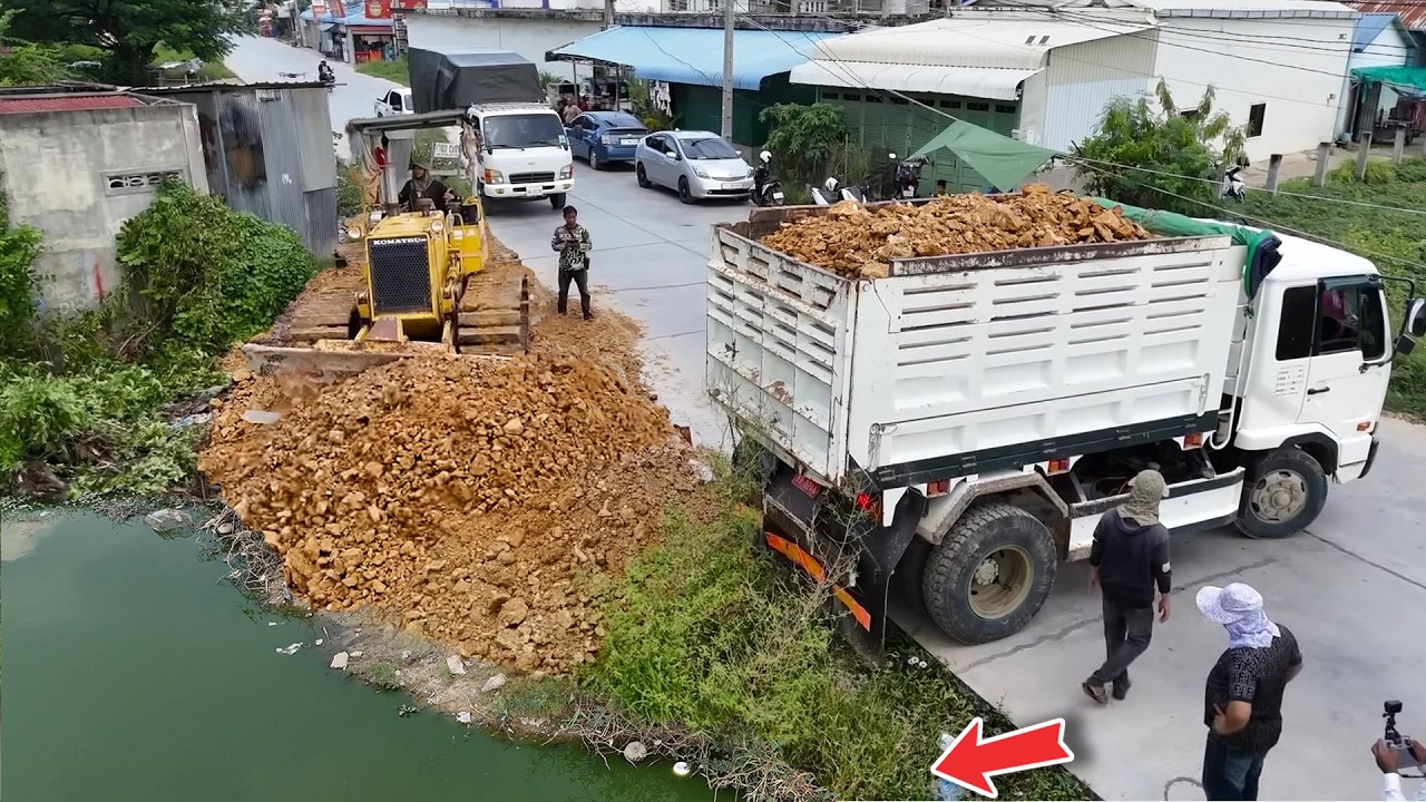 Excellent Talented leader used 5ton trucks dumping soil & push fill huge area by Dozer D31P