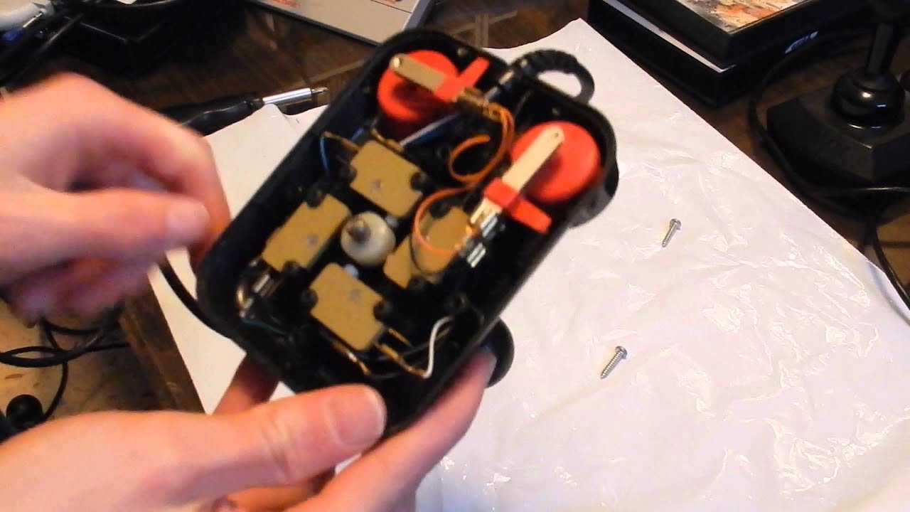 A detailed look at two competition pro joysticks found at a fleamarket