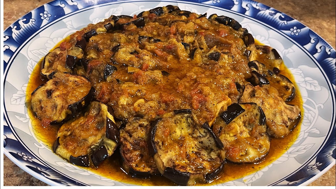 طاجين مغربي اللحم بالدنجال البرانية أو طاجين اللحم مدربل