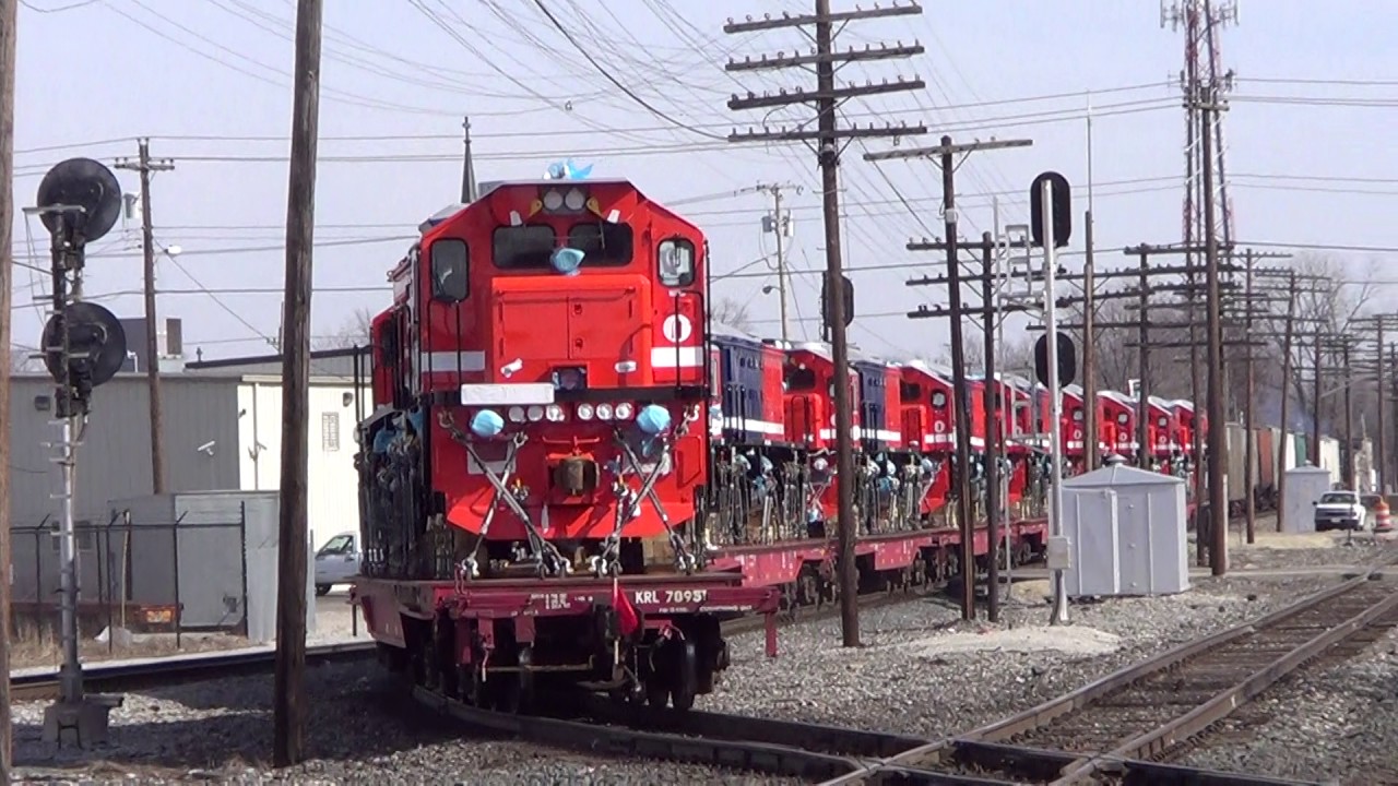 2/18/2013 Muncie, IN - NS train with 10 new, narrow guage engines followed by a CSX coal train.