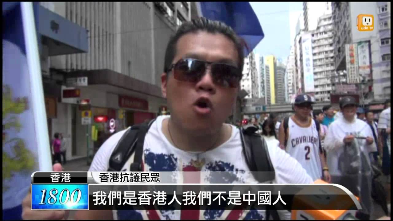 【2013.07.01】香港七一遊行 民眾風雨中爭普選 -udn tv
