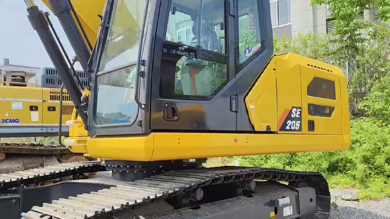 SHANTUI SE205&mdash;brand-new excavator, in stock now. Check out its sleek exterior. Ready to go.