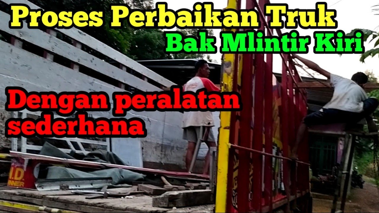melihat proses perbaikan bak truk yang terguling dan bodi elf