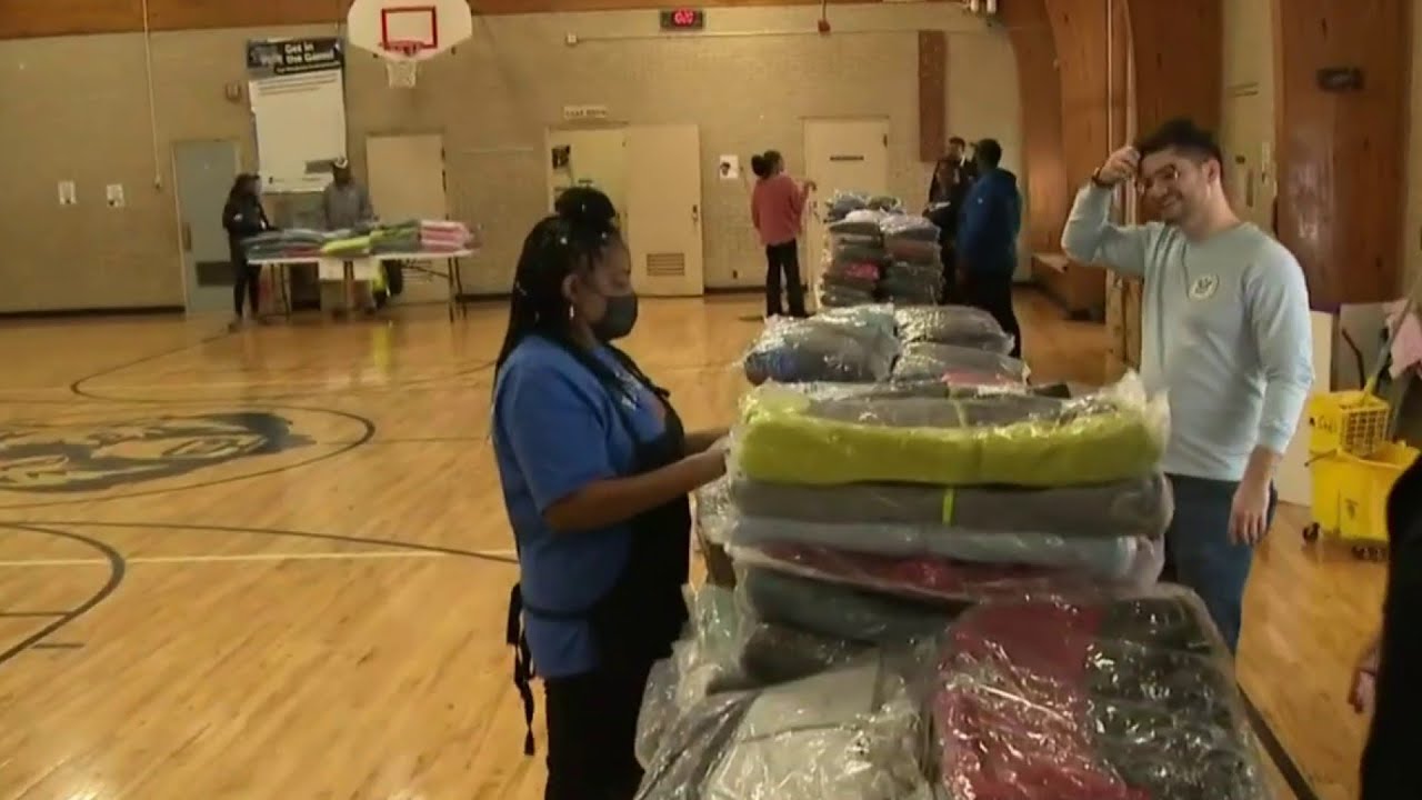 Amazon donates and delivers hundreds of coats to Pontiac elementary school