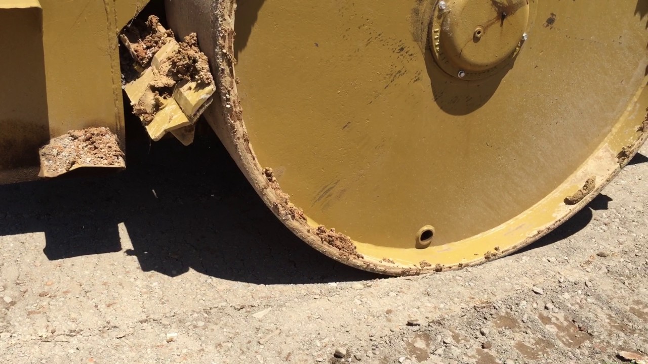 Road roller preparing subgrade of a new road - Sydney Subdivision