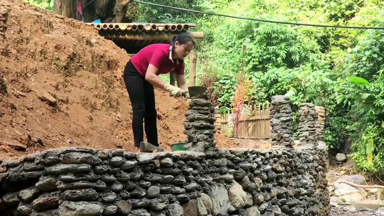 Design a stone retaining wall to prevent landslides