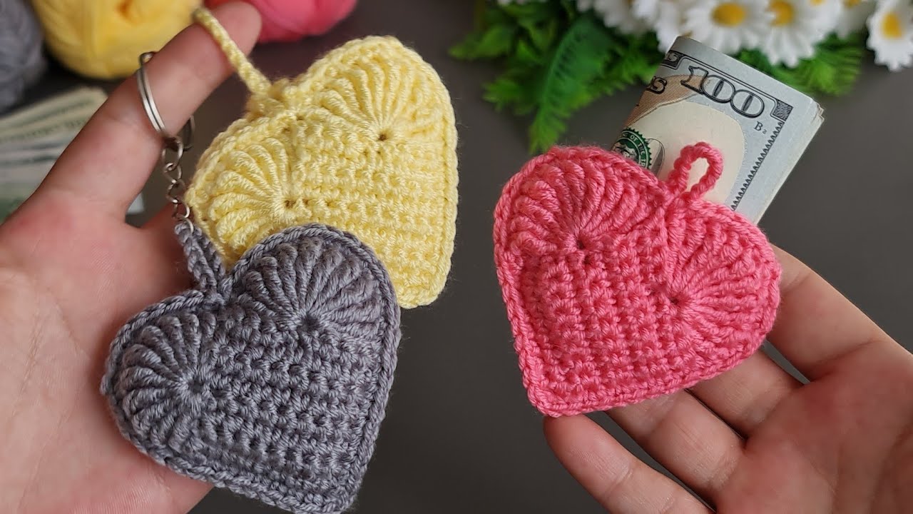 I made a great number of them and sold them all. 💰💰💰Crochet heart wallet keychain making. Worderful😇