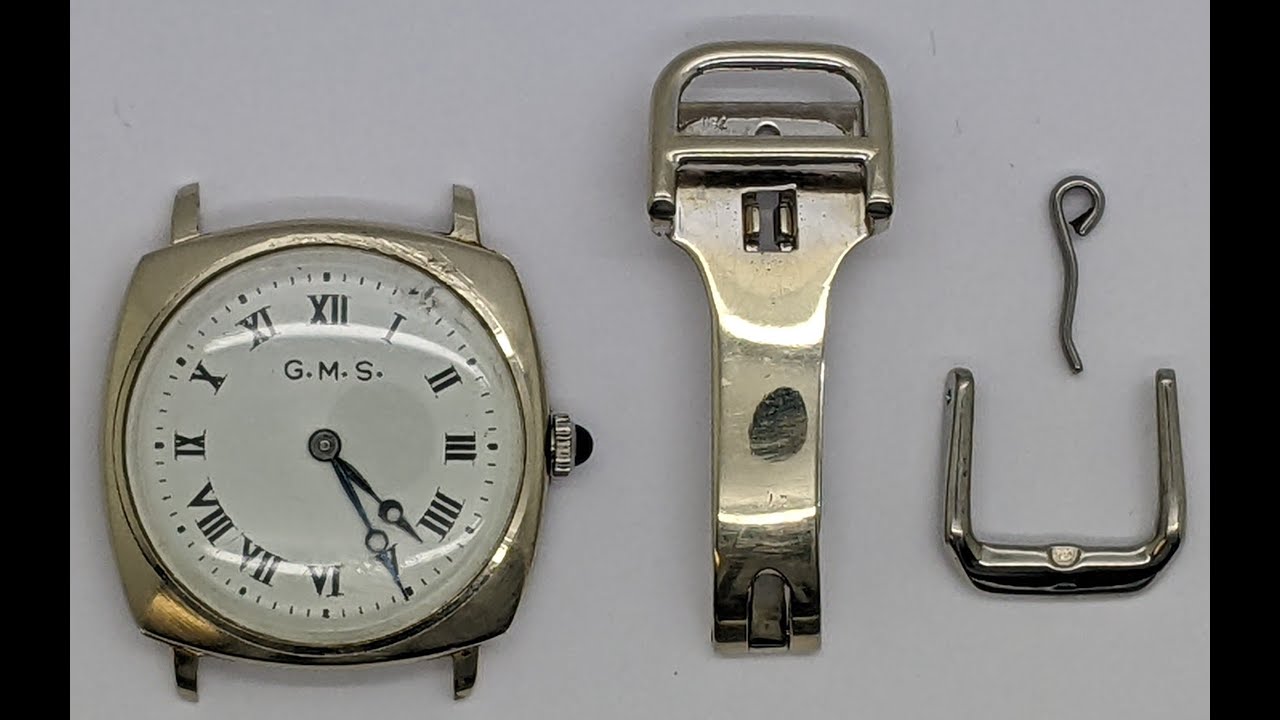 18 Karat White Gold Vintage Men's Baume & Mercier Cushion Shape Wrist Watch with Clasp