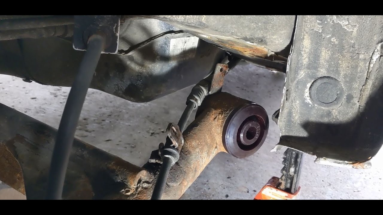 Chevy Aveo rear axle bushing replacement, DIY at home, 1/2 - passenger side