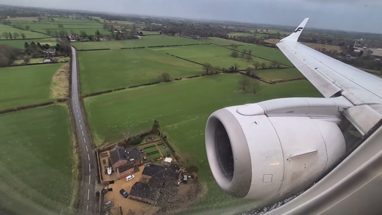 Landing in the Manchester airport with long taxiing to front of terminal