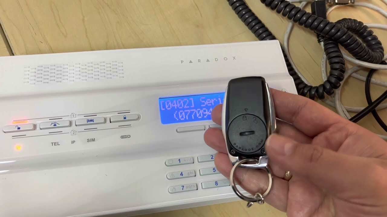 Como averiguar el SN de un control remoto 🕹️ de alarma Paradox