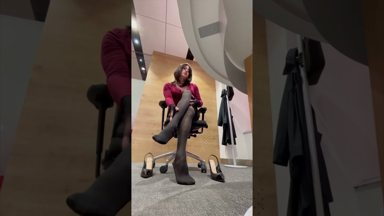 Secretary taking off her high heels