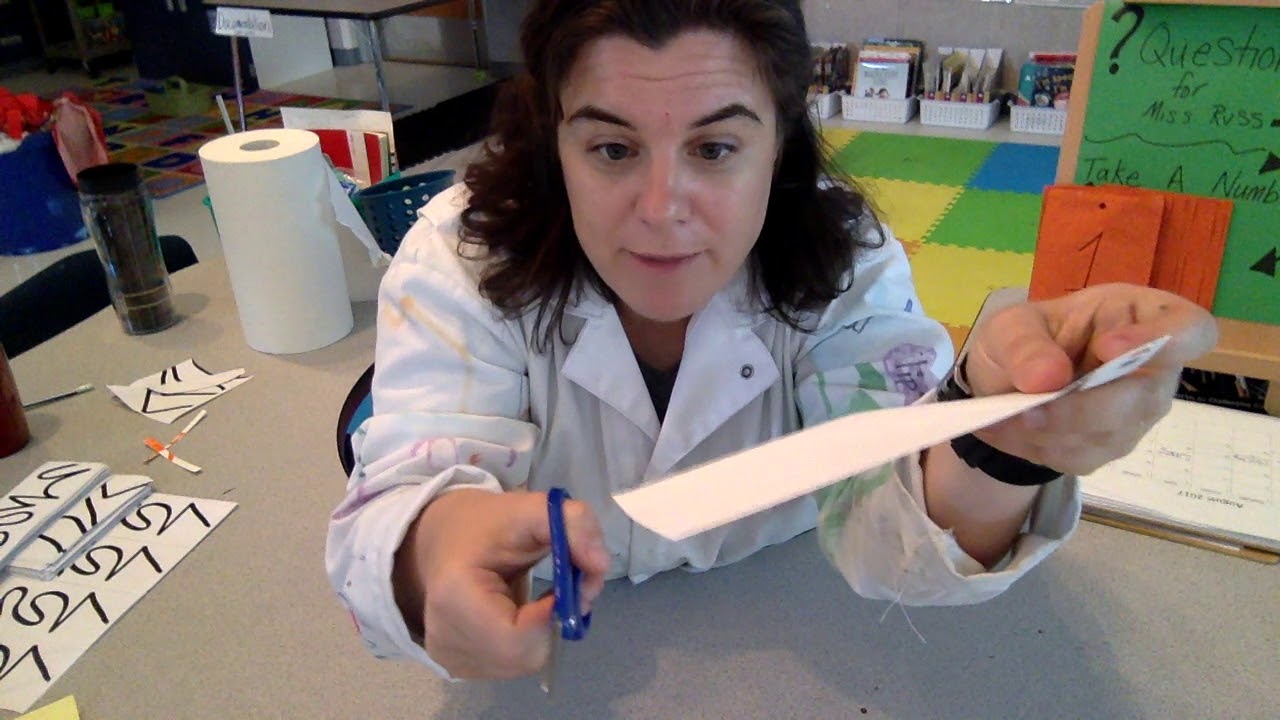 Kindergarten learning how to use scissors (Mixed Media Skill Level A 1 of 2)