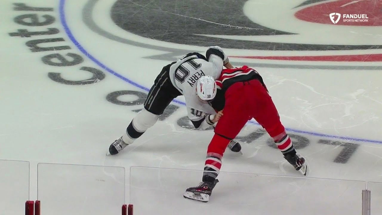 Corey Perry and Jordan Martinook drop the gloves right off the hop to start the second period.