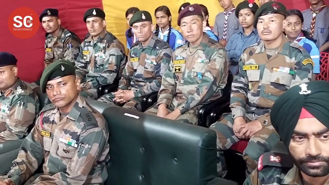 Indian Army welcomes two Sikkim Scouts Army along with other Indian Army Officers after summiting
