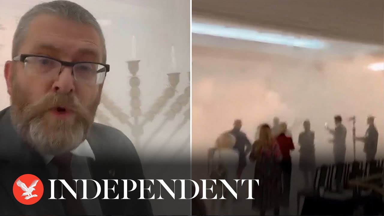 Polish MP Grzegorz Braun sprays Hanukkah menorah with fire extinguisher