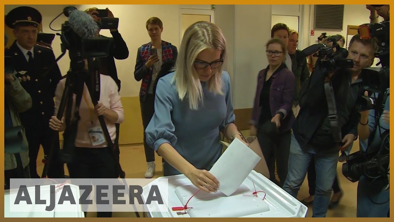 Russians vote in local polls after weeks of protests