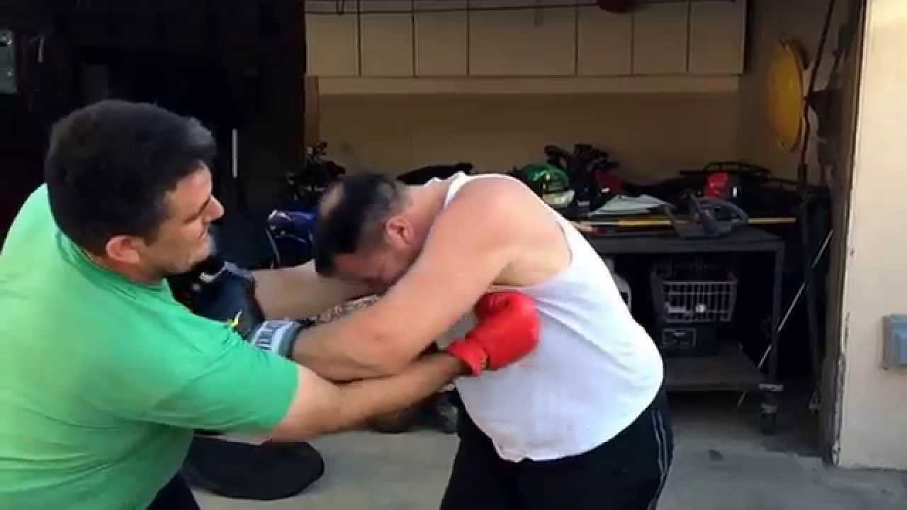 Two fat guys fighting with boxing gloves in slo- motion!