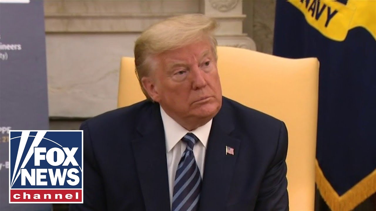 Trump blasts CNN, Jim Acosta for past coverage of Michael Flynn