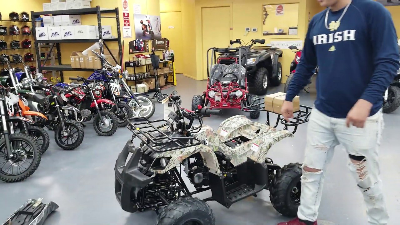 125cc D atv taotao  demostracion de como encerder la moto y como hacer el cambio de aceite y mas